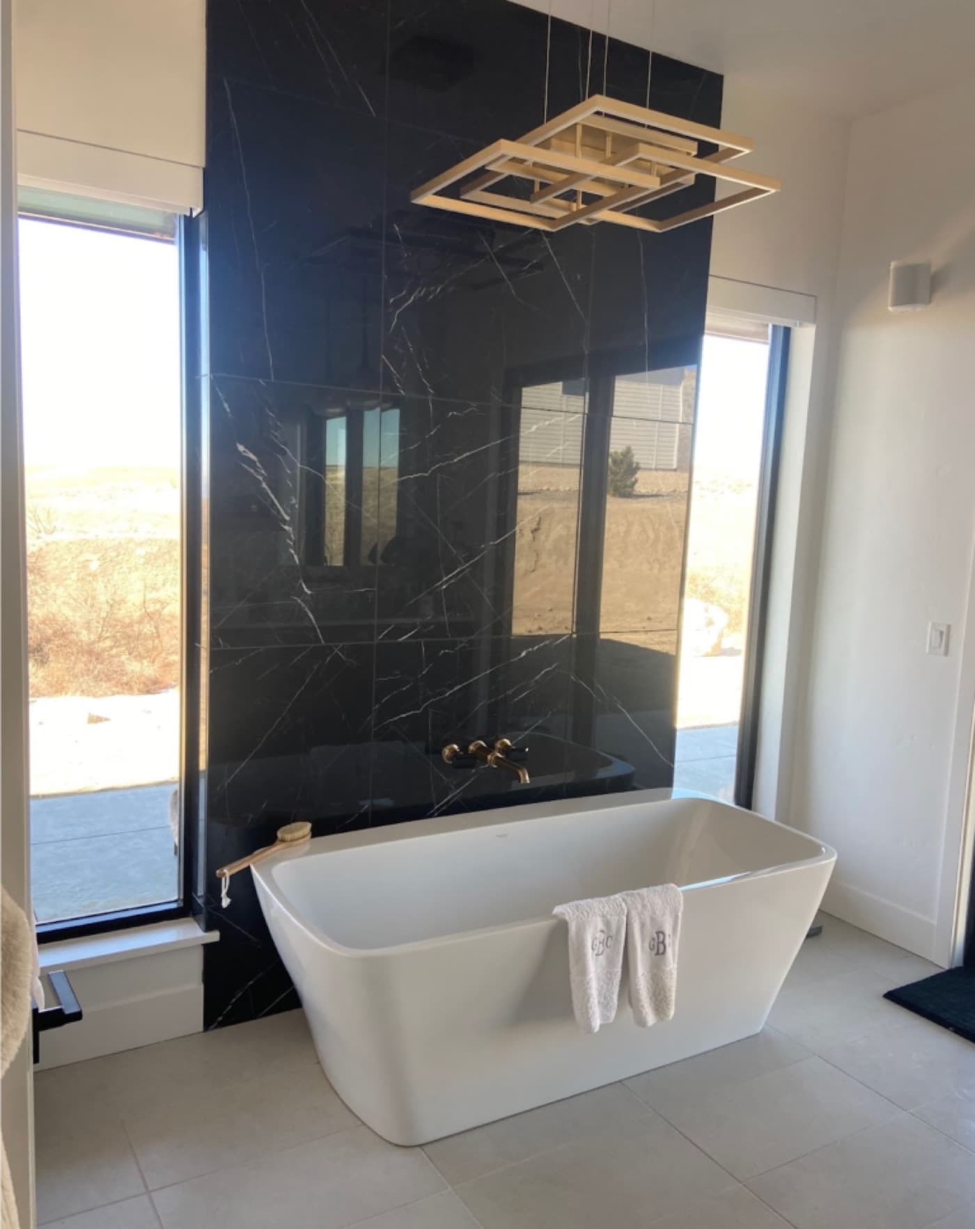 Freestanding tub with wall-mount filler installed in a Treasure Valley bathroom by Ritchie Plumbing