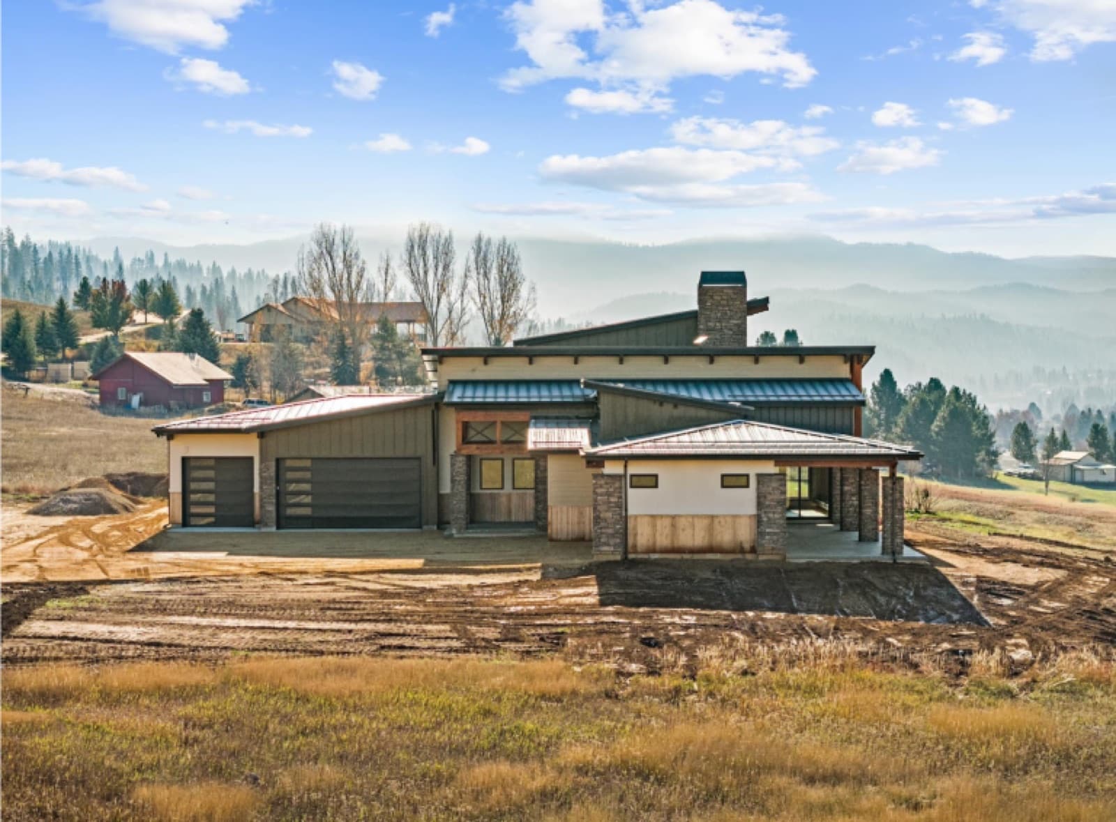 Completed custom home in the Idaho foothills plumbed by Ritchie Plumbing